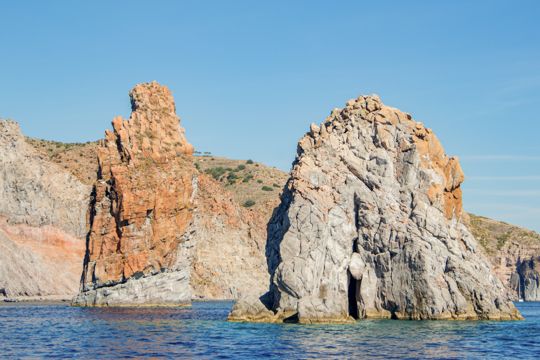Two rocky pinnacles beside the coastline